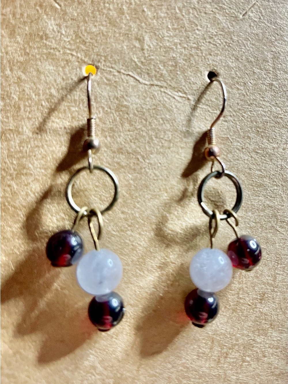 Rose quartz and Garnets earring s on ear wires very pretty handmade. 1 pair. .